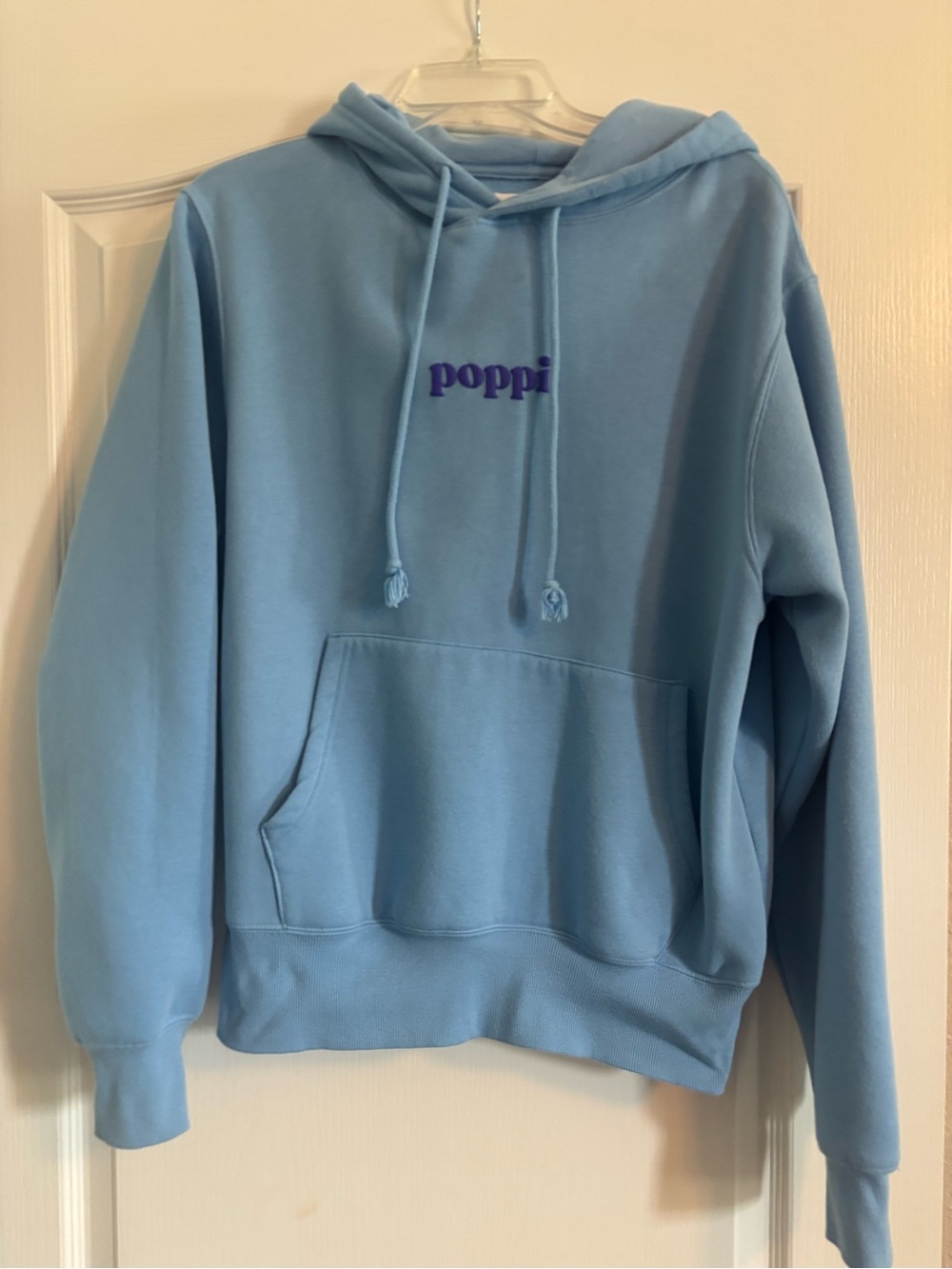 Light Blue Poppi Logo Pullover Hoodie size medium in good condition